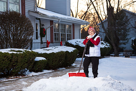 woman digging snow