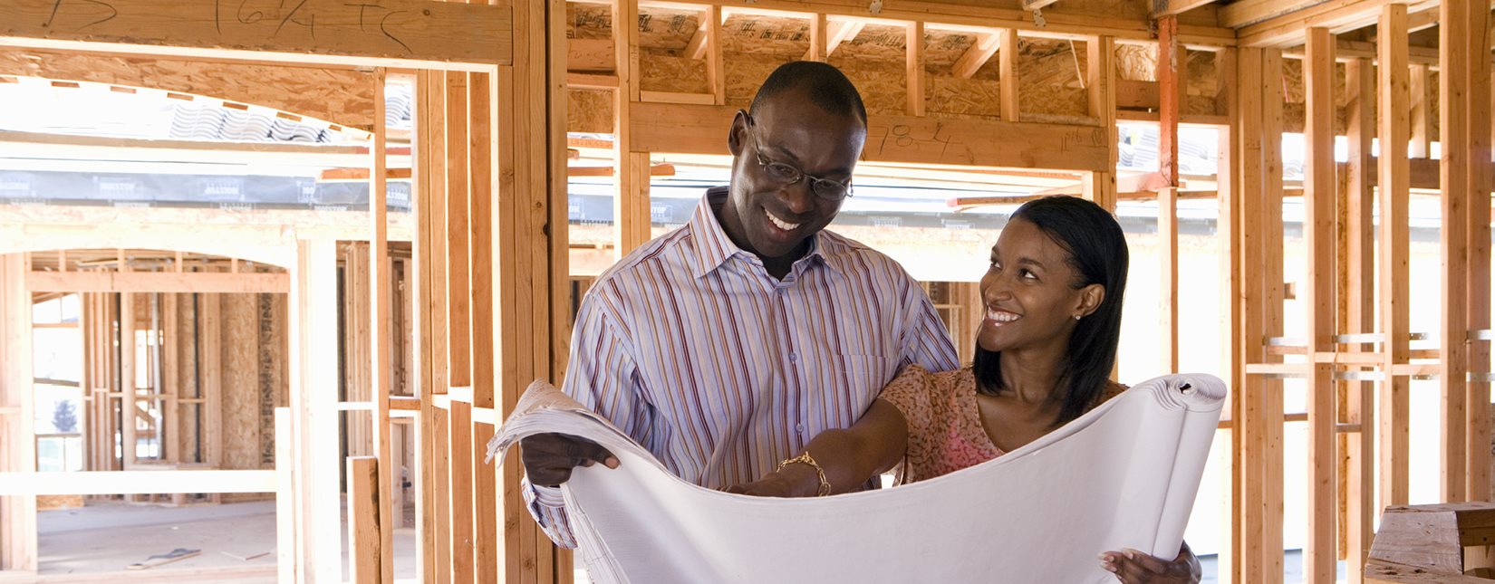 happy couple building house