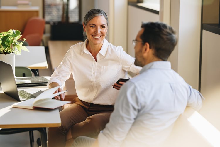 two people smiling