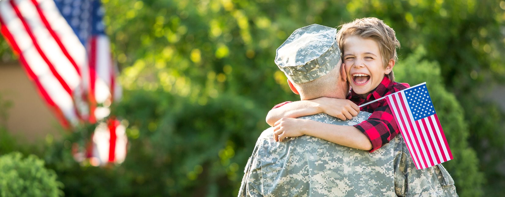 soldier holding son